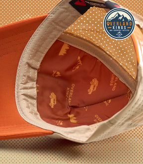 NAMIB (CREAM/ORANGE) OK PERF+ TRUCKER CAP